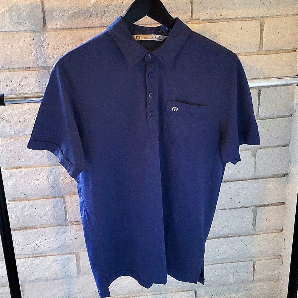 Travis Mathew golf shirt M stretch polo blue pocket stitched logo